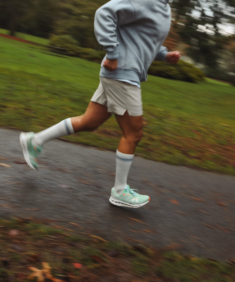 A runner wearing Wϋl compression socks 