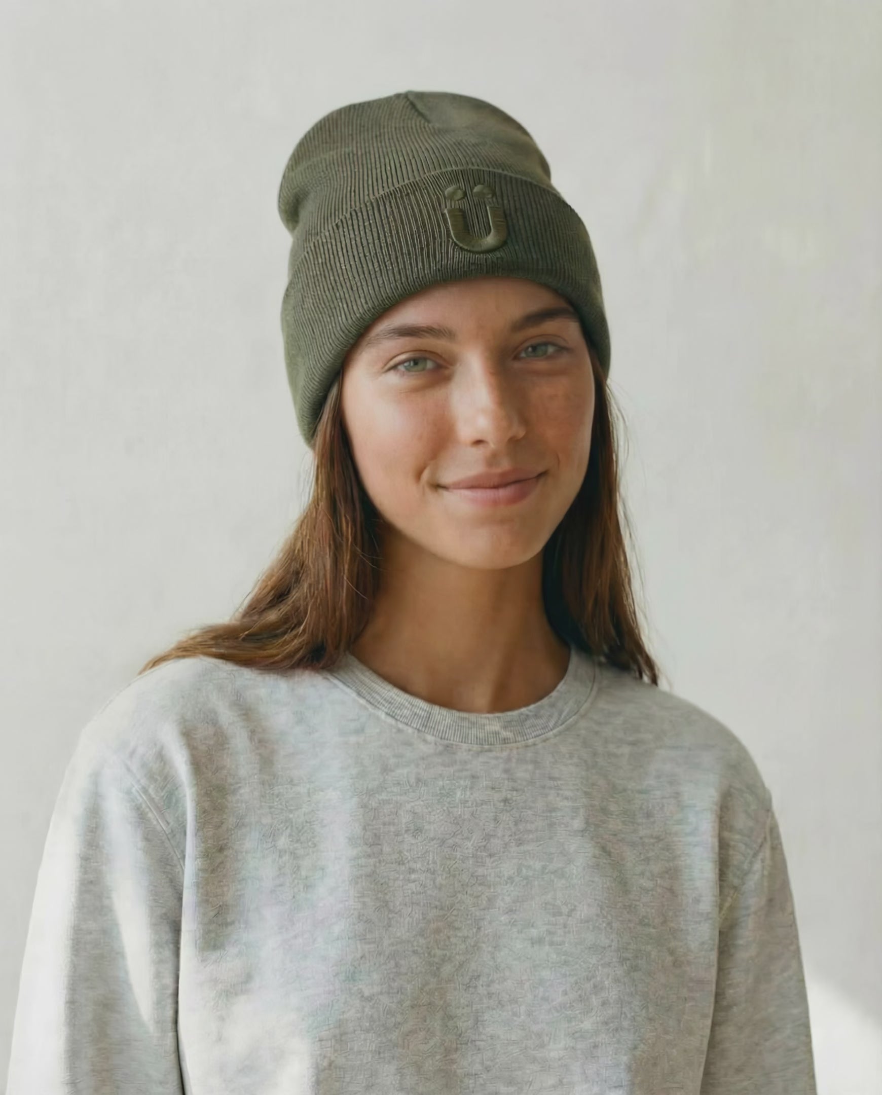 Load video: Model wearing Forest Green Merino Wool Beanie